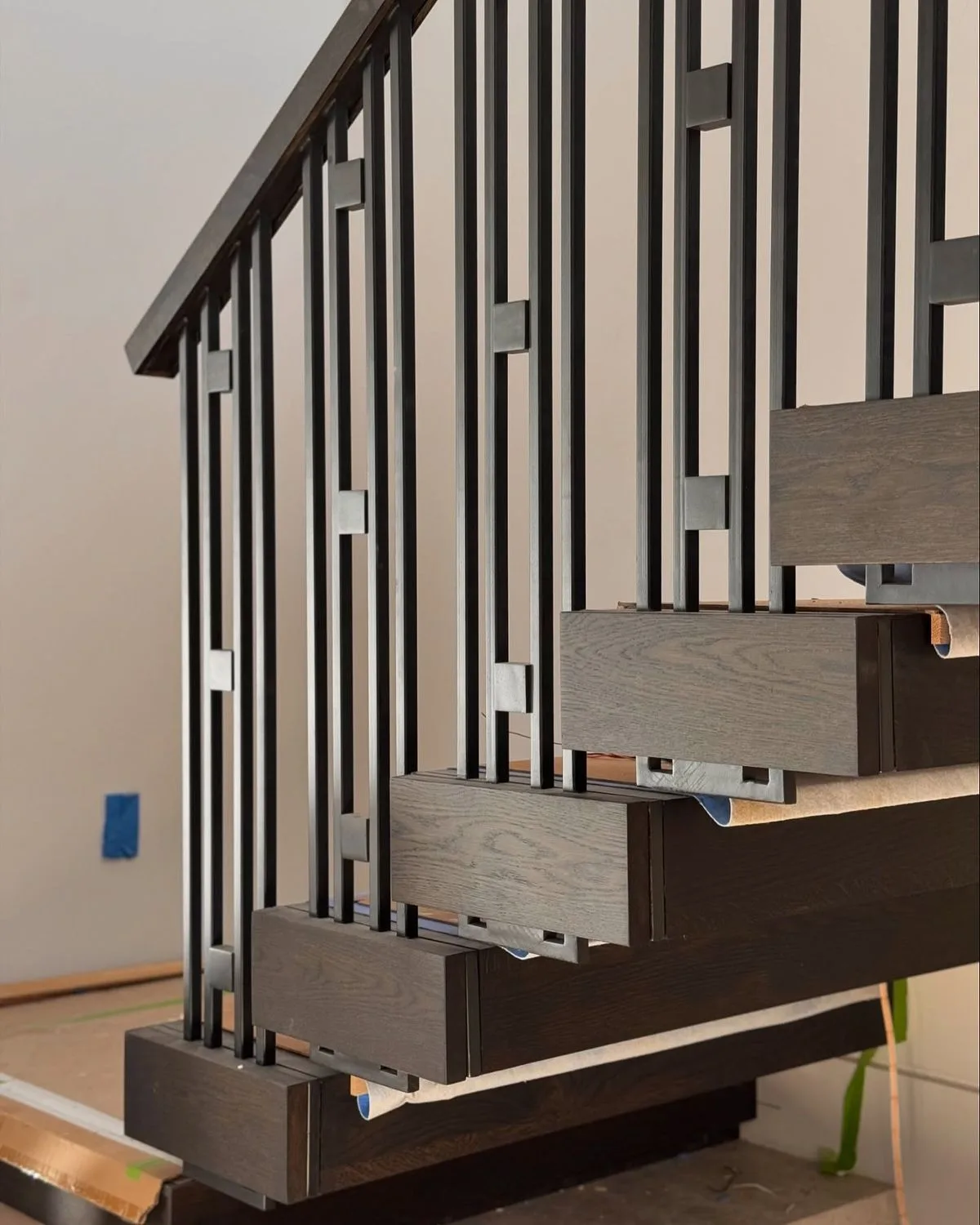 User-supplied steel staircase and metal detailing reference